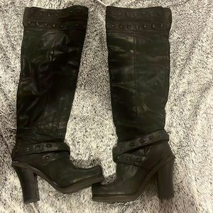 Thigh high black leather boots with heel